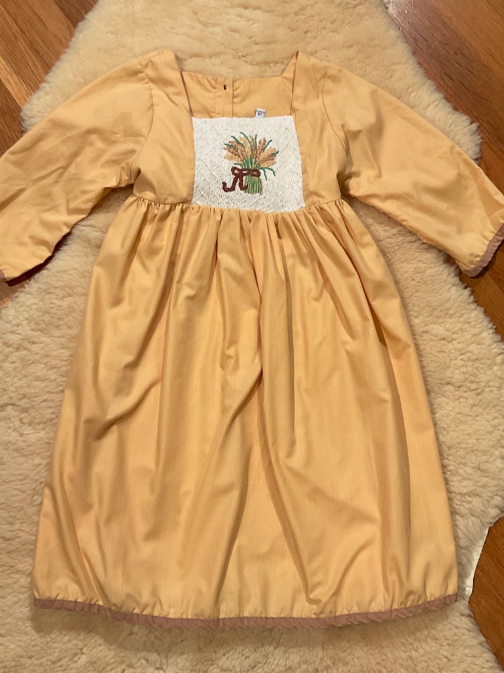 Vintage handmade light mustard yellow smocked dress